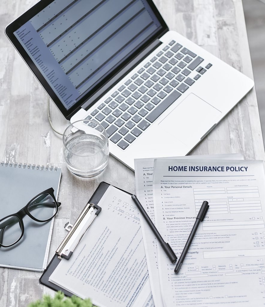 Small business professional evaluating cyber insurance and security requirements